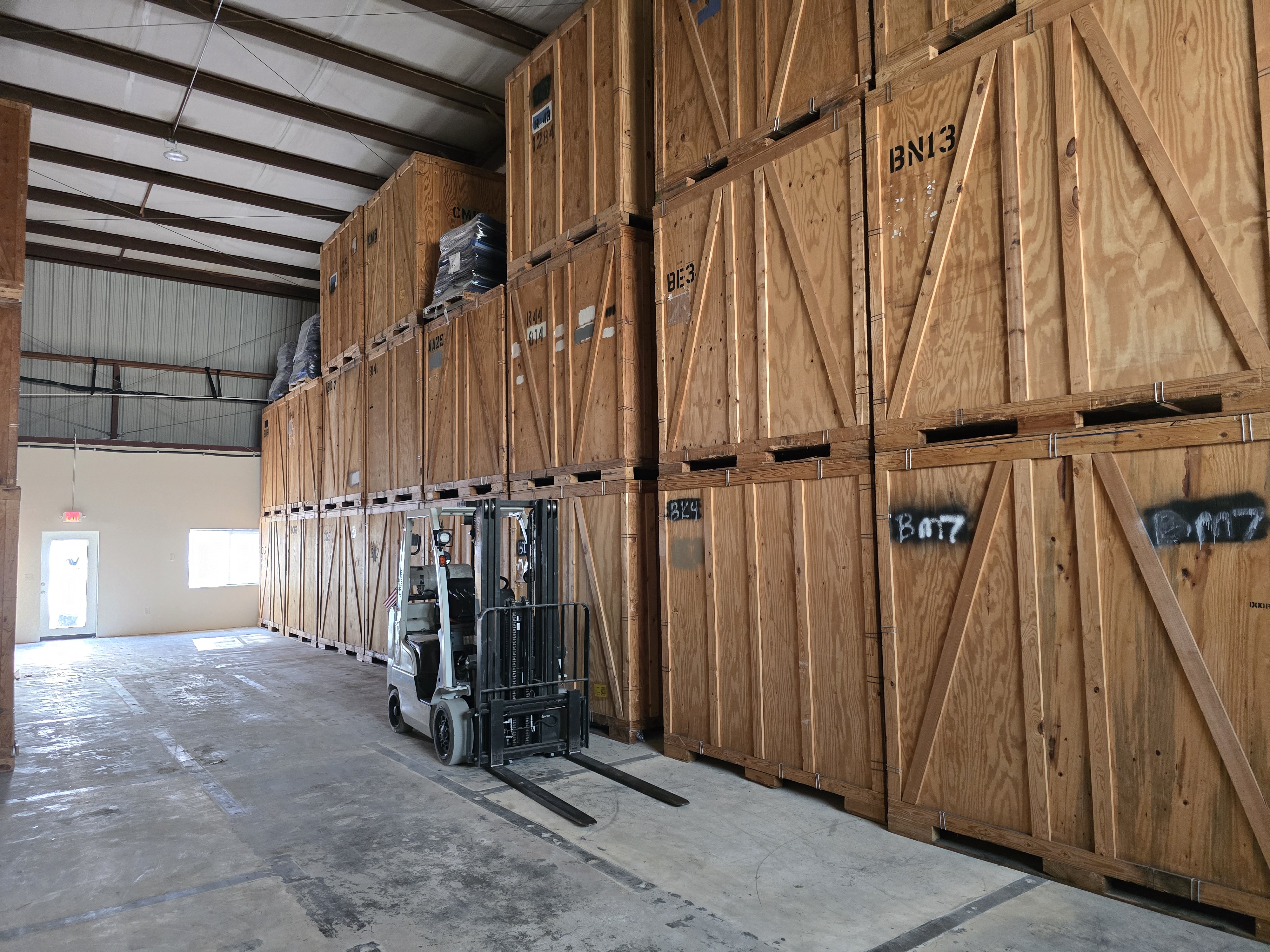 Secure storage units and moving containers